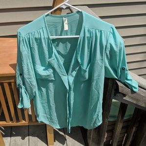 Beautiful teal blouse for work and fun!